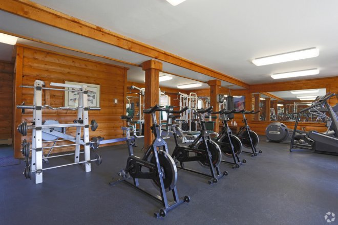 Stationary bikes, weights and treadmills in the fitness center at our apartments.