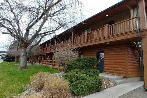 Two story apartment comlex near University of Co student housing.
